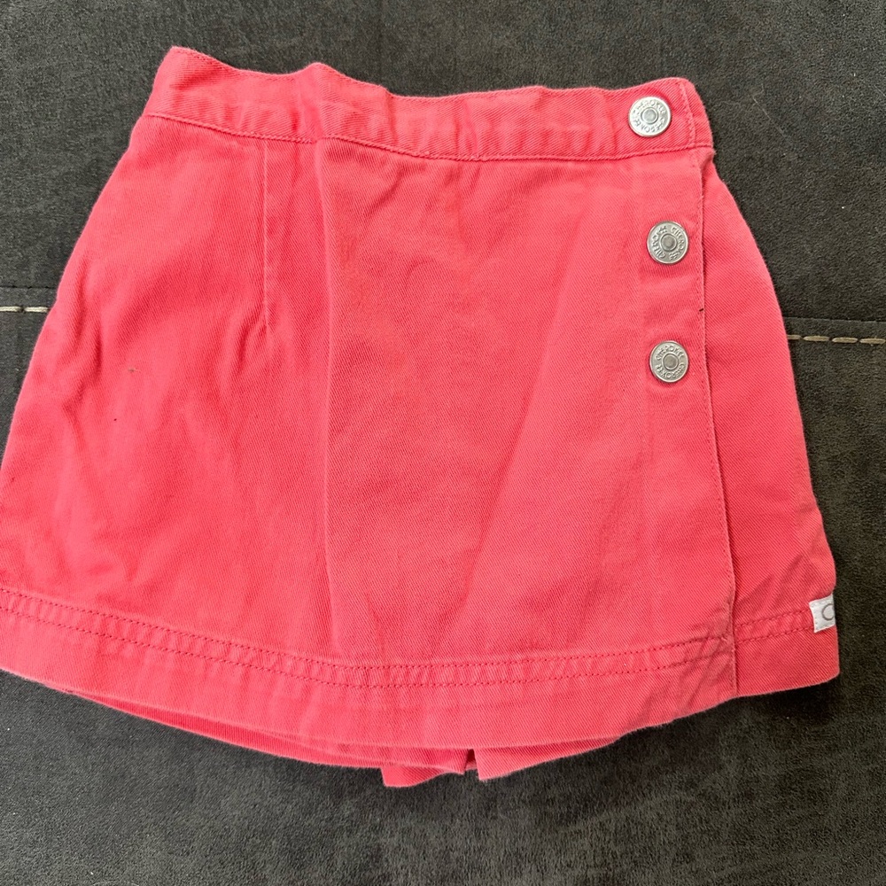 Coral colored skort. Size 6 to 9 months Cherokee brand